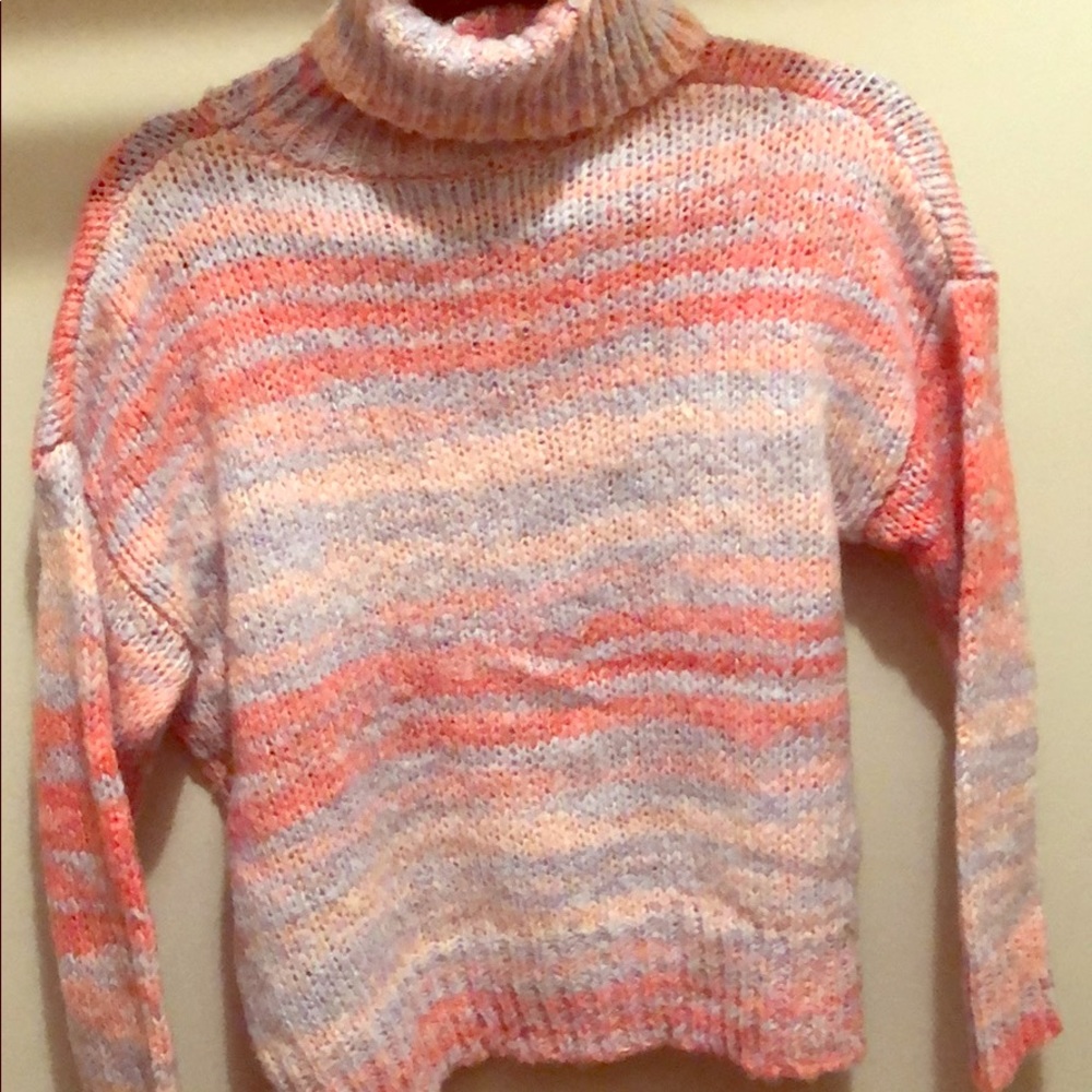 A pink sweater